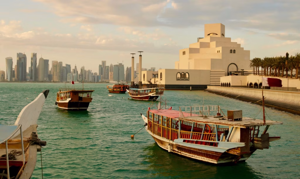 boats waterfront modern city white building qatar doha
